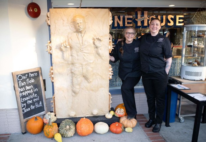 Creators Hannalee Pervan (R) and Catherine Pervan (L) stand for a photo in front of their creation 