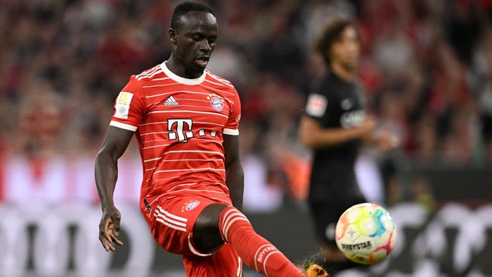 Bayern Munichs Senegalese forward Sadio Mane scores the 4-0 goal during the German first division Bundesliga football match between FC Bayern Munich and SC Freiburg in Munich, southern Germany on October 16, 2022. - DFL REGULATIONS PROHIBIT ANY USE OF PHOTOGRAPHS AS IMAGE SEQUENCES AND/OR QUASI-VIDEO (Photo by CHRISTOF STACHE / AFP) / DFL REGULATIONS PROHIBIT ANY USE OF PHOTOGRAPHS AS IMAGE SEQUENCES AND/OR QUASI-VIDEO (Photo by CHRISTOF STACHE/AFP via Getty Images)