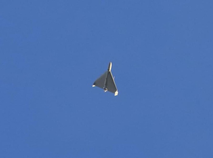 A drone is seen in the sky seconds before it fired on buildings in Kyiv, Ukraine, Monday, Oct. 17, 2022. (AP Photo/Efrem Lukatsky)