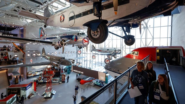 Patrons visit the Smithsonians National Air and Space Museum for the public reopening of the museum’s west end galleries on the National Mall in Washington, U.S. October 14, 2022. The museum, which before closing for renovations trailed only the Louvre in Paris as the world’s most visited museums, is scheduled to fully reopen when the east end is completed in 2025. REUTERS/Jonathan Ernst