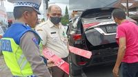 Duh! Mobil Dinas Fortuner Ketua DPRD MInahasa Pakai Pelat Palsu