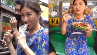 FSarwendah dikenal sosok yang sederhana. Istri Ruben Onsu ini tampak senang ketika memborong jajanan kaki lima di Pasar Mayestik. Ia membeli pisang goreng hingga sate ayam. oto: YouTube/Instagram