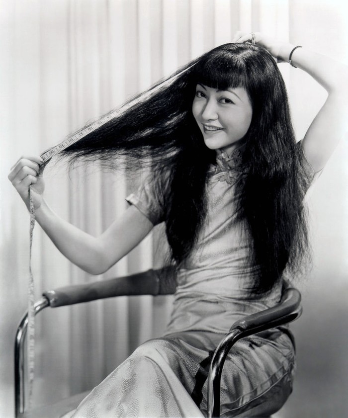 Anna May Wong (January 3, 1905 Ð February 3, 1961) was an American actress, the first Chinese American movie star, and the first Asian American to become an international star. Her long and varied career spanned both silent and sound film, television, stage, and radio. Born near the Chinatown neighborhood of Los Angeles to second-generation Chinese-American parents, Wong became infatuated with the movies and began acting in films at an early age. During the silent film era, she acted in The Toll of the Sea (1922), one of the first movies made in color and Douglas Fairbanks' The Thief of Bagdad (1924). Wong became a fashion icon, and by 1924 had achieved international stardom. Frustrated by the stereotypical supporting roles she reluctantly played in Hollywood, she left for Europe in the late 1920s, where she starred in several notable plays and films, among them Piccadilly (1929). She spent the first half of the 1930s traveling between the United States and Europe for film and stage work. Wong was featured in films of the early sound era, such as Daughter of the Dragon (1931) and Daughter of Shanghai (1937), and with Marlene Dietrich in Josef von Sternberg's Shanghai Express (1932). In 1935 Wong was dealt the most severe disappointment of her career, when Metro-Goldwyn-Mayer refused to consider her for the leading role in its film version of Pearl S. Buck's The Good Earth, choosing instead the German actress Luise Rainer to play the leading role. Wong spent the next year touring China, visiting her family's ancestral village and studying Chinese culture. In the late 1930s, she starred in several B movies for Paramount Pictures, portraying Chinese-Americans in a positive light. She paid less attention to her film career during World War II, when she devoted her time and money to helping the Chinese cause against Japan. Wong returned to the public eye in the 1950s in several television appearances as well as her own series in 1951, The Gallery of Madame Liu-Tsong, the
