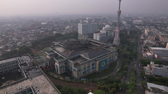 JAKARTA, INDONESIA - OCTOBER 20: An aerial photo shows a collapsed dome of Jakarta Islamic Center Mosque after a fire that occurred yesterday in Jakarta, Indonesia on October 20, 2022. (Photo by Riky Sultana/Anadolu Agency via Getty Images)