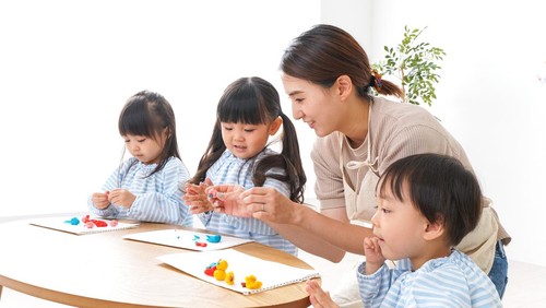 Childrens nurse and kindergarten child