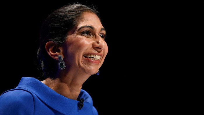 British Home Secretary Suella Braverman walks on Downing Street, in London, Britain, October 11, 2022. REUTERS/Toby Melville