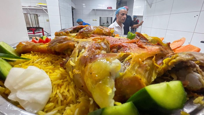 A dish of Mandi meat is pictured at a restaurant in Sanaa, Yemen October 9, 2022, as the traditional Yemeni meal is getting more popularity among gourmets in Yemen and abroad. REUTERS/Khaled Abdullah
