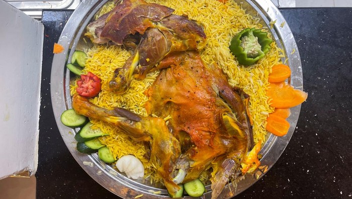 A dish of Mandi meat is pictured at a restaurant in Sanaa, Yemen October 9, 2022, as the traditional Yemeni meal is getting more popularity among gourmets in Yemen and abroad. REUTERS/Khaled Abdullah
