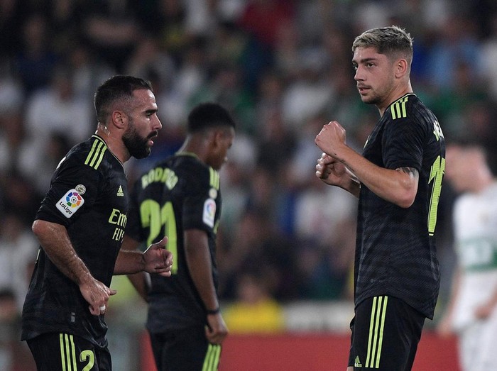 Soccer Football - LaLiga - Elche v Real Madrid - Estadio Manuel Martinez Valero, Elche, Spain - October 19, 2022 Real Madrid's Marco Asensio celebrates scoring their third goal with teammate Karim Benzema REUTERS/Pablo Morano