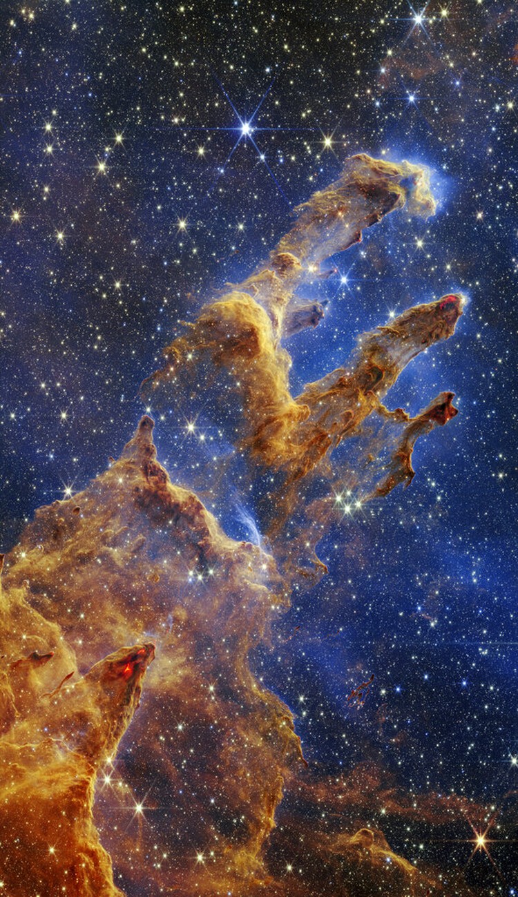 Terpukau Indahnya Galaksi yang Dipotret Teleskop Termahal NASA This image released by NASA on Wednesday, Oct. 19, 2022, shows the Pillars of Creation, captured by the James Webb Space Telescope in near-infrared-light view. (NASA, ESA, CSA, STScI via AP)