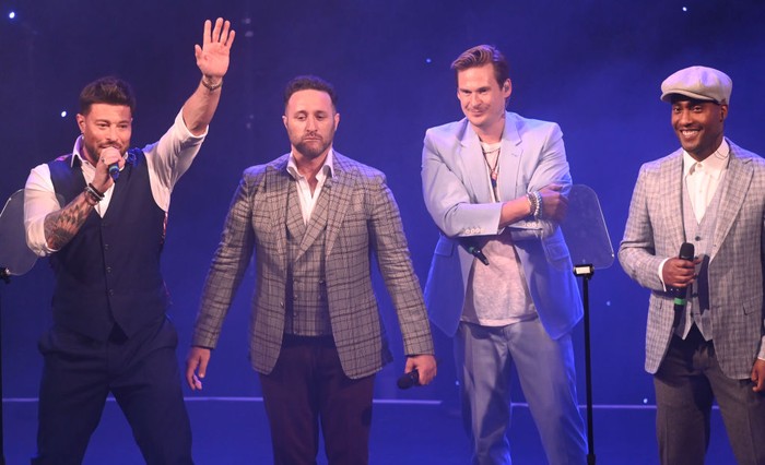 LONDON, ENGLAND - JULY 06: Antony Costa, Lee Ryan, Simon Webbe and Duncan James of Blue perform during the TRIC Awards 2022 at Grosvenor House on July 06, 2022 in London, England. (Photo by Dave J Hogan/Getty Images)