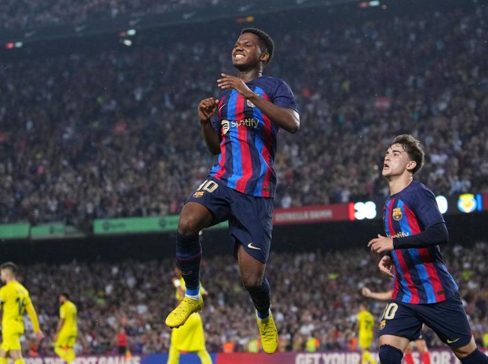 BARCELONA, SPAIN - OCTOBER 20: Ansu Fati of FC Barcelona celebrates after scoring their sides third goal during the LaLiga Santander match between FC Barcelona and Villarreal CF at Spotify Camp Nou on October 20, 2022 in Barcelona, Spain. (Photo by Alex Caparros/Getty Images)