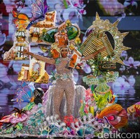 Kostum nasional berikut menampilkan berbagai budaya dan kekayaan alam dari Honduras. Busana Miss Grand Honduras Saira Cacho terinspirasi penemuan Hondurasi oleh Christopher Colombus. Foto: Kenny Gida/Detikcom