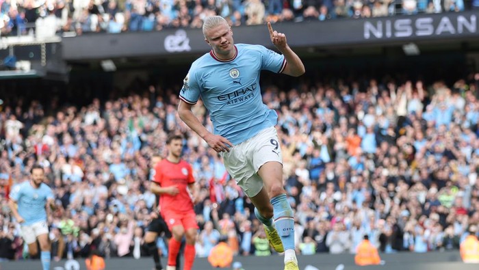 MANCHESTER, ENGLAND - OCTOBER 22: Erling Haaland of Manchester City celebrates after scoring their teams second goal from the penalty spot during the Premier League match between Manchester City and Brighton & Hove Albion at Etihad Stadium on October 22, 2022 in Manchester, England. (Photo by Manchester City FC/Manchester City FC via Getty Images)
