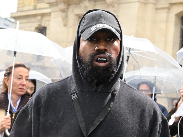 PARIS, FRANCE - OCTOBER 02: (EDITORIAL USE ONLY - For Non-Editorial use please seek approval from Fashion House) Kanye West attends the Givenchy Womenswear Spring/Summer 2023 show as part of Paris Fashion Week  on October 02, 2022 in Paris, France. (Photo by Stephane Cardinale - Corbis/Corbis via Getty Images)