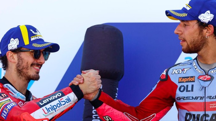 ALCANIZ, SPAIN - SEPTEMBER 18: Francesco Pecco Bagnaia and Enea Bastianini of Italy on the podium during the MotoGP race at Motorland Aragon Circuit on September 18, 2022 in Alcaniz, Spain. (Photo by Joan Cros Garcia - Corbis/Corbis via Getty Images)