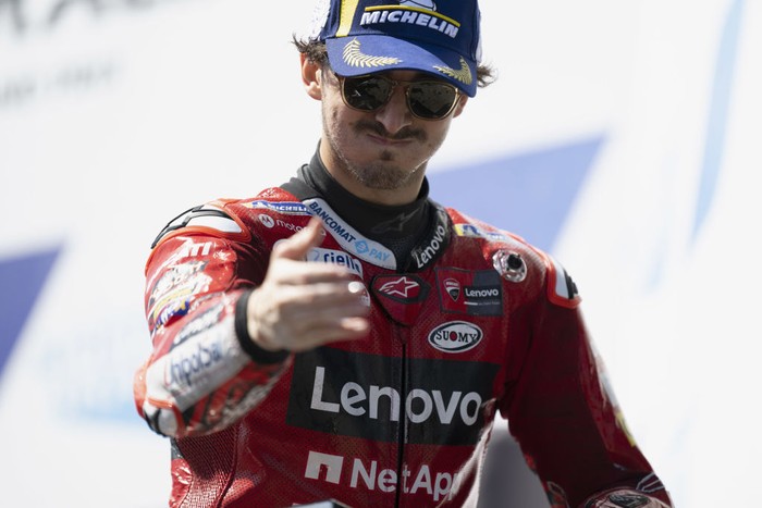 PHILLIP ISLAND, AUSTRALIA - OCTOBER 16:  Francesco Bagnaia of Italy and Ducati Lenovo Team celebrates the third place on the podium during the MotoGP race during the MotoGP of Australia at Phillip Island Grand Prix Circuit on October 16, 2022 in Phillip Island, Australia. (Photo by Mirco Lazzari gp/Getty Images)