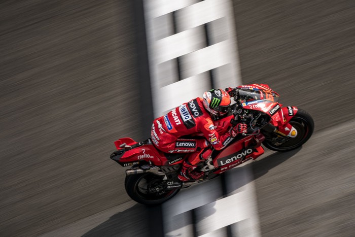 PHILLIP ISLAND, AUSTRALIA - OCTOBER 16:  Francesco Bagnaia of Italy and Ducati Lenovo Team celebrates the third place on the podium during the MotoGP race during the MotoGP of Australia at Phillip Island Grand Prix Circuit on October 16, 2022 in Phillip Island, Australia. (Photo by Mirco Lazzari gp/Getty Images)