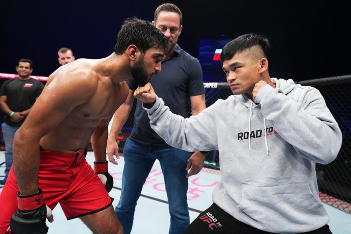 ABU DHABI, UNITED ARAB EMIRATES - OCTOBER 23: (L-R) Finalists Anshul Jubli of India and Jeka Saragih of Indonesia face off during the Road to UFC event at Etihad Arena on October 23, 2022 in Abu Dhabi, United Arab Emirates. (Photo by Chris Unger/Zuffa LLC)