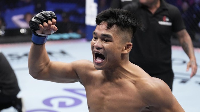 ABU DHABI, UNITED ARAB EMIRATES - OCTOBER 23: Jeka Saragih of Indonesia celebrates after his knockout victory over WonBin Ki of South Korea in a lightweight fight during the Road to UFC event at Etihad Arena on October 23, 2022 in Abu Dhabi, United Arab Emirates. (Photo by Chris Unger/Zuffa LLC)
