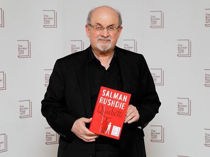British author Salman Rushdie poses with his book Quichotte during the photo call for the authors shortlisted for the 2019 Booker Prize for Fiction at Southbank Centre in London on October 13, 2019. (Photo by Tolga AKMEN / AFP) (Photo by TOLGA AKMEN/AFP via Getty Images)