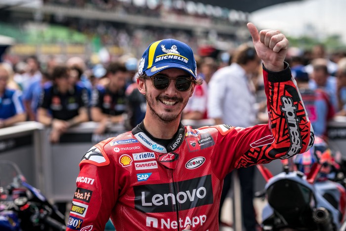 KUALA LUMPUR, MALAYSIA - OCTOBER 23: Francesco Bagnaia of Italy and Ducati Lenovo Team thumbs up at parc ferme during the race of the MotoGP PETRONAS Grand Prix of Malaysia at Sepang Circuit on October 23, 2022 in Kuala Lumpur, Malaysia. (Photo by Steve Wobser/Getty Images)