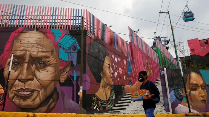 Keren, Mural Warna-warni Hiasi Permukiman Padat di Meksiko Murals are seen on Las Mercedes market in the Iztapalapa neighbourhood in Mexico City, Mexico October 20, 2022. REUTERS/Raquel Cunha