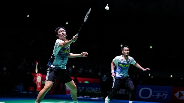 OSAKA, JAPAN - AUGUST 31: Mohammad Ahsan (R) and Hendra Setiawan of Indonesia compete in the Mens Doubles First Round match against Kang Min Hyuk and Seo Seung Jae of Korea during day two of Daihatsu Yonex Japan Open at Maruzen Intec Arena Osaka on August 31, 2022 in Osaka, Japan. (Photo by Shi Tang/Getty Images)