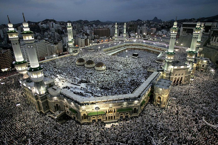 MECCA, SAUDI ARABIA - JANUARY 17:  Muslim pilgrims pray around the holy Kaaba at Meccas Grand Mosque during the annual hajj rituals January 17, 2005 in Mecca, Saudi Arabia. According to the Saudi Hajj ministry, about two million muslim pilgrims from around the world have arrived at Mecca to perform Al-Hajj or Bilgirame.  (Photo by Abid Katib/Getty Images)