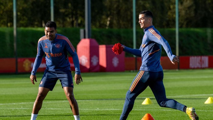 Cristiano Ronaldo MANCHESTER, ENGLAND - OCTOBER 25: Cristiano Ronaldo of Manchester United in action during a Manchester United training session at Carrington Training Ground on October 25, 2022 in Manchester, England. (Photo by Ash Donelon/Manchester United via Getty Images)