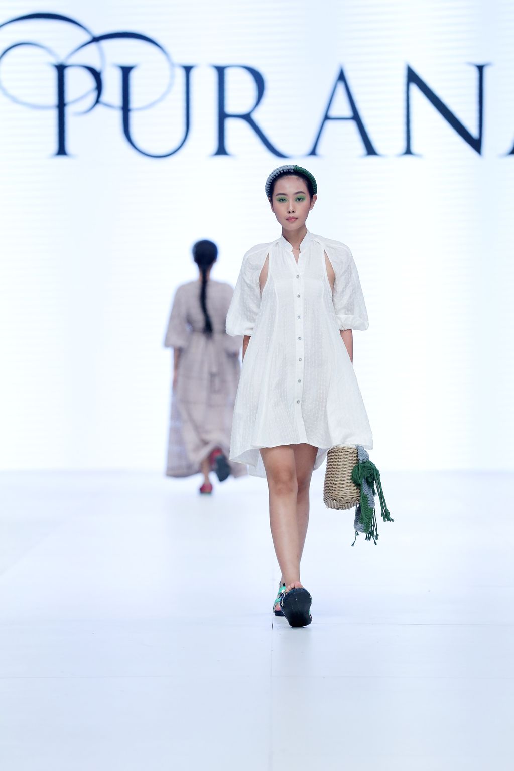 OCTOBER 24: A model walks the runway of Dewi's Luxe Market presents Womens Resort Wear featuring Purana during Jakarta Fashion Week 2023 in City Hall – Pondok Indah Mall 3, Jakarta.