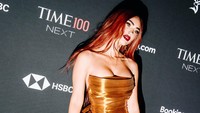 Saya tak masalah jadi simbol seks. Saya tak pernah berpikir itu adalah sesuatu yang negatif, kata Megan Fox. Foto: Getty Images for TIME/Kevin Mazur