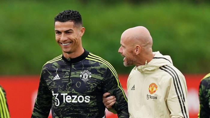 Manchester Uniteds Cristiano Ronaldo speaks to manager Erik ten Hag during a training session at the Aon Training Complex, Greater Manchester. Picture date: Wednesday September 14, 2022. (Photo by Martin Rickett/PA Images via Getty Images)