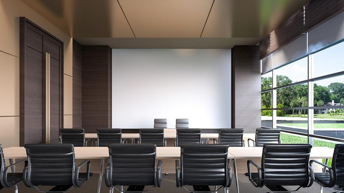 Large conference room with projector screen