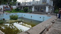 Puing-puing rumah mewah Pablo Escobar kini menjadi bagian dari atraksi Hacienda Napoles yang dipugar jadi taman hiburan. (Foto: Getty Images)