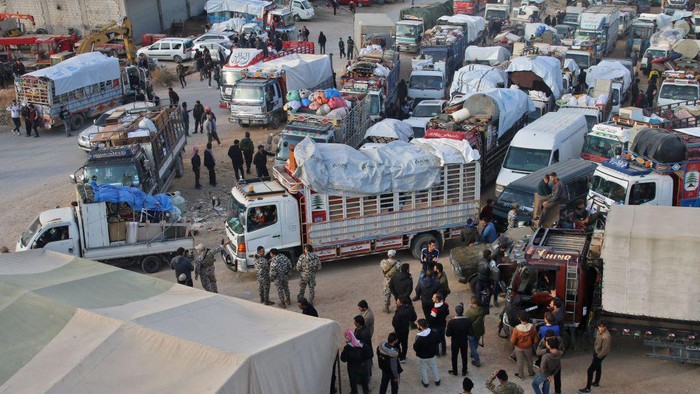 Syrians refugees prepare to leave Lebanon towards Syrian territory through the Wadi Hamid crossing in Arsal on October 26, 2022. - A first batch of Syrian refugees left Lebanon today for their home country, an AFP photographer said, the first step in a new repatriation plan slammed by rights groups. (Photo by AFP) (Photo by -/AFP via Getty Images)