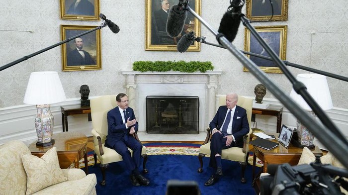 Israels President Isaac Herzog, left, speaks during a meeting with President Joe Biden in the Oval Office of the White House, Wednesday, Oct. 26, 2022, in Washington. (AP Photo/Patrick Semansky)