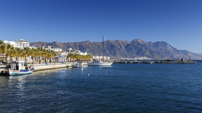 Harbour of Kardamena village and mountains of Kos island, Greece.