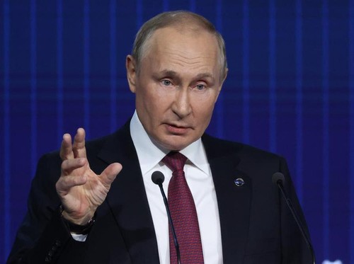 Russian President Vladimir Putin gestures while speaking at the plenary session of the 19th annual meeting of the Valdai International Discussion Club outside Moscow, Russia, Thursday, Oct. 27, 2022. (Sergei Karpukhin, Sputnik, Kremlin Pool Photo via AP)