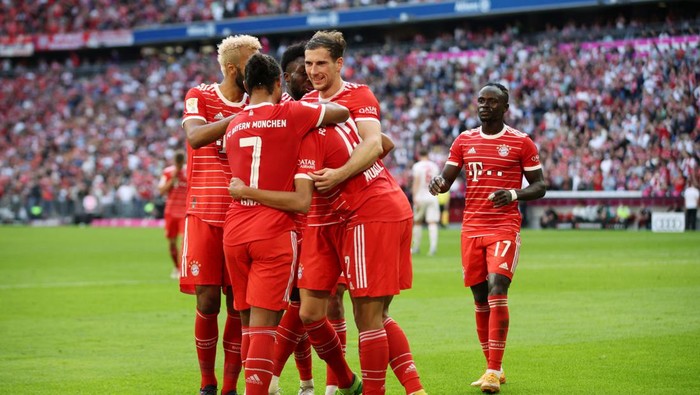 MUNICH, GERMANY - OCTOBER 29: Jamal Musiala of Bayern Munich celebrates with teammates after scoring their teams second goal during the Bundesliga match between FC Bayern München and 1. FSV Mainz 05 at Allianz Arena on October 29, 2022 in Munich, Germany. (Photo by Adam Pretty/Getty Images)