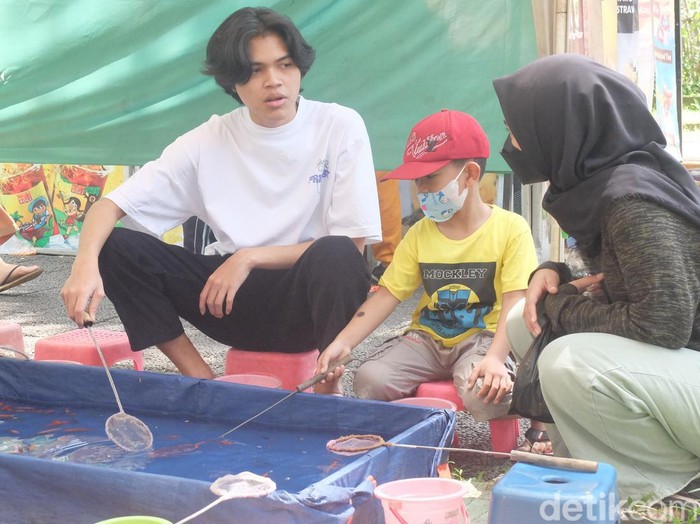 Permainan tangkap ikan.