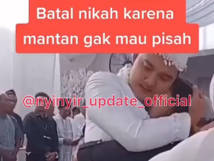 Unggahan viral di media sosial, seorang pengantin pria memeluk seorang wanita. Unggahan viral di media sosial, seorang pengantin pria memeluk seorang wanita bikin heboh warganet.