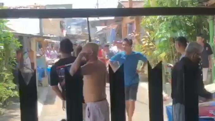 Bentrokan warga di Manado.
