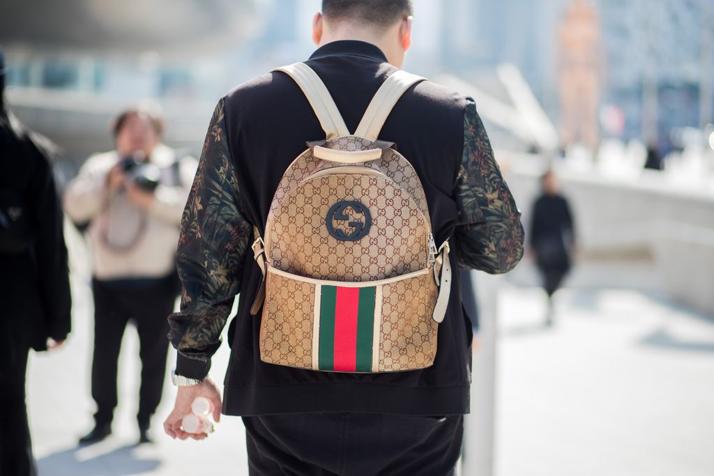 SEOUL, SOUTH KOREA - MARCH 22: A guest wearing Gucci backpack is seen at the Hera Seoul Fashion Week 2018 F/W at Dongdaemun Design Plaza on March 22, 2018 in Seoul, South Korea. (Photo by Christian Vierig/Getty Images)