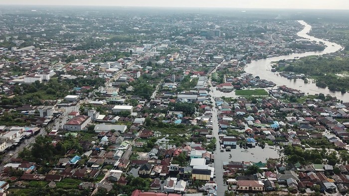 Foto Udara Banjir di Kalimantan Tengah Sebanyak 22 Kecamatan 108 kelurahan/desa di Kalteng terendam banjir. Begini potret banjir di Kalimantan Tengah dari udara.