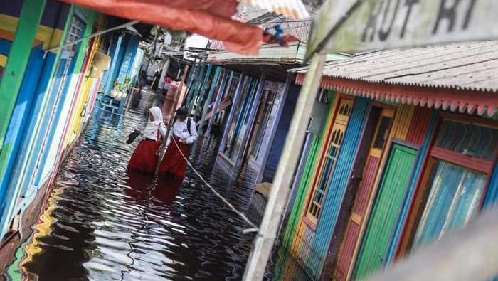 Foto Udara Banjir di Kalimantan Tengah Sebanyak 22 Kecamatan 108 kelurahan/desa di Kalteng terendam banjir. Begini potret banjir di Kalimantan Tengah dari udara.