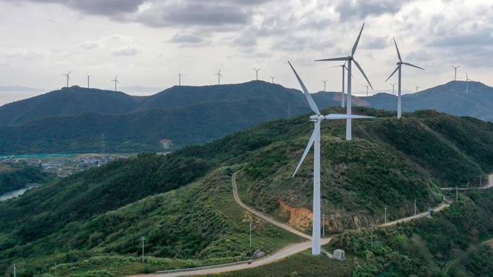ZHOUSHAN, CHINA - NOVEMBER 1, 2022 - An aerial photo shows wind turbines turning under the action of sea breeze at Qushandao Wind Farm in Zhoushan City, Zhejiang Province, China, Nov 1, 2022. (Photo credit should read CFOTO/Future Publishing via Getty Images)