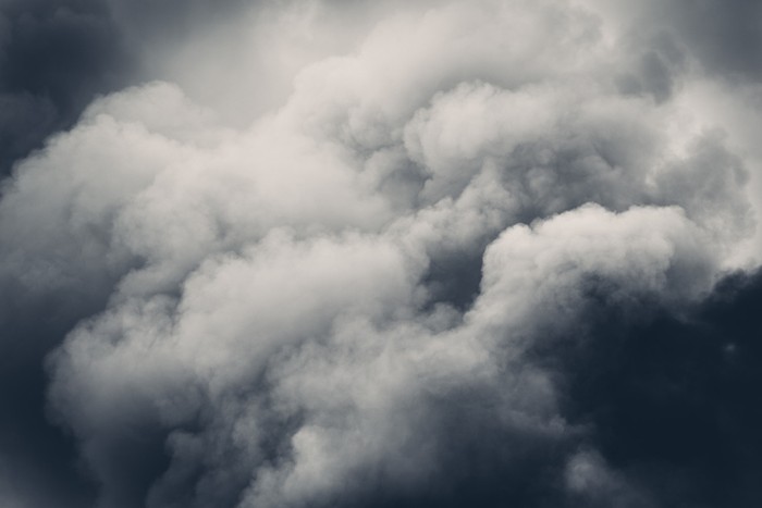 Grey clouds of smoke in the sky.