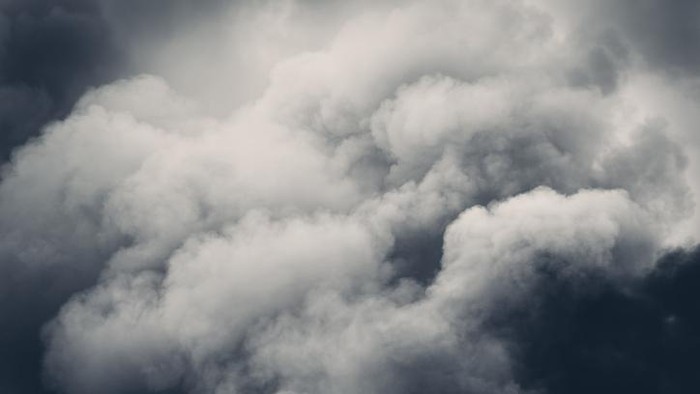 Grey clouds of smoke in the sky.