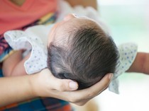 Mengenal Ngebuyu, Tradisi Menyambut Kelahiran Bayi di Lampung